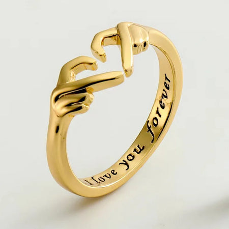 Celebrate love with the Romantic Heart Hand Hug Ring, symbolizing a deep and everlasting connection.